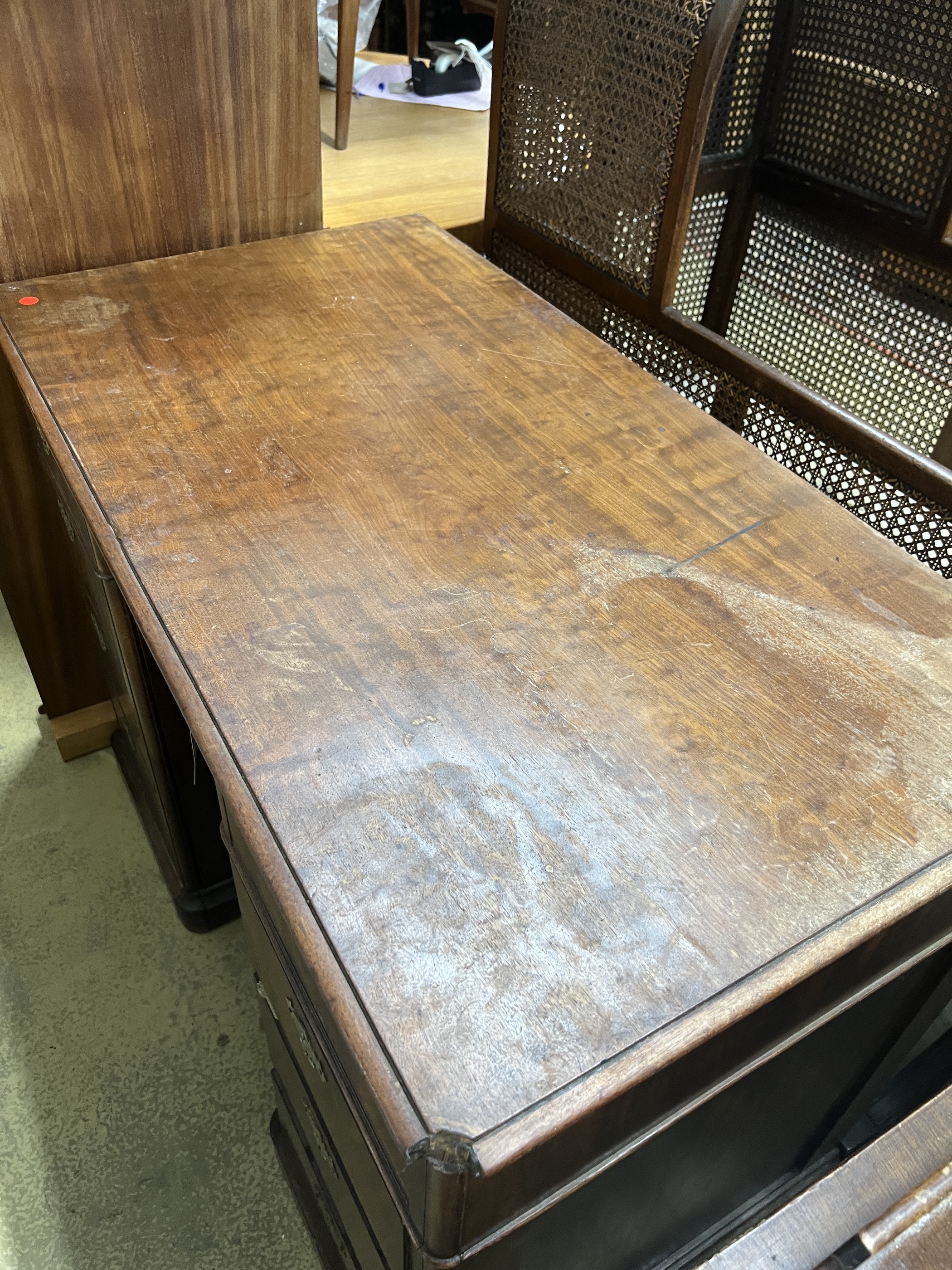 A 19th century Continental mahogany kneehole desk, length 105cm, depth 55cm, height 80cm